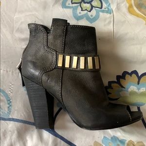 Guess ankle booties with open toes.
